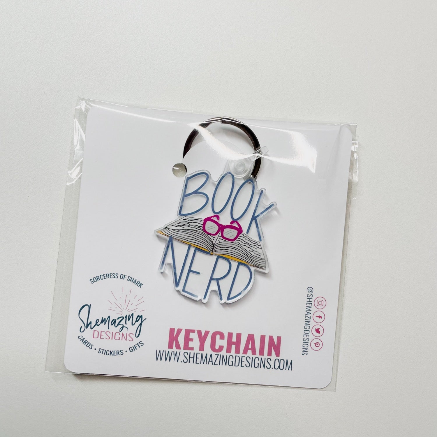 book nerd keychain in packaing